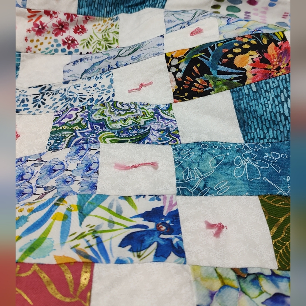 Handmade patchwork tied vintage lap quilt